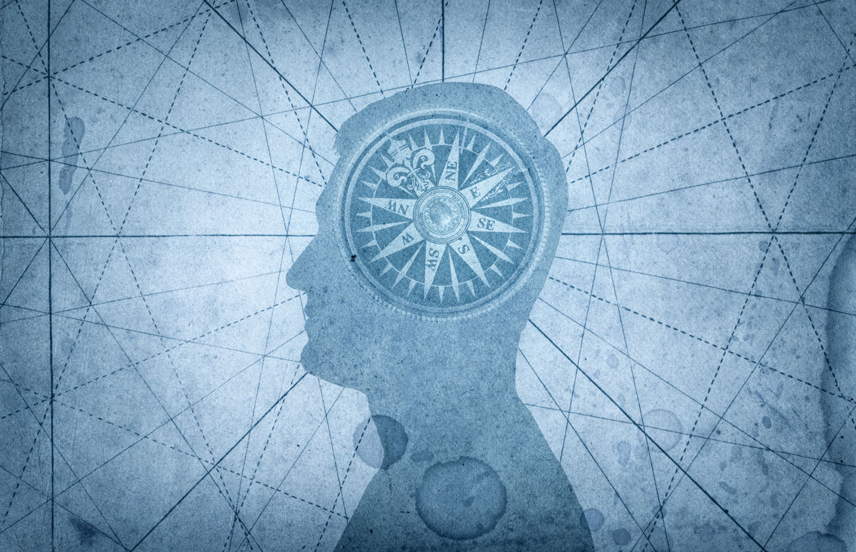 Moral compass-silhouette of man's head with compass rose inside