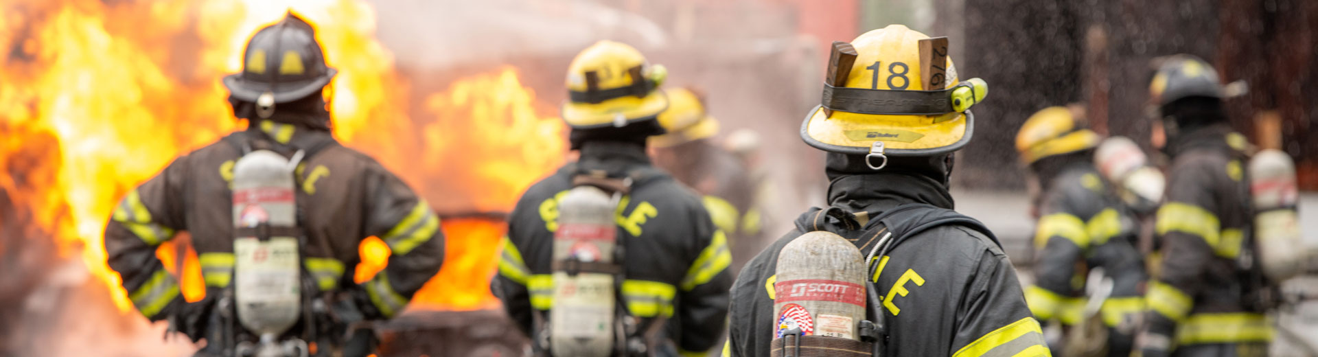 fire fighters on the scene of a big fire