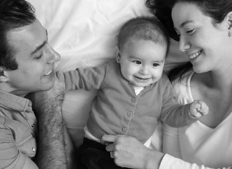 happy parents with baby